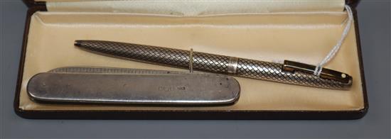 A George V silver fruit knife with engraved blade, Sheffield, 1913 and a cased sterling silver Schaeffer pen.